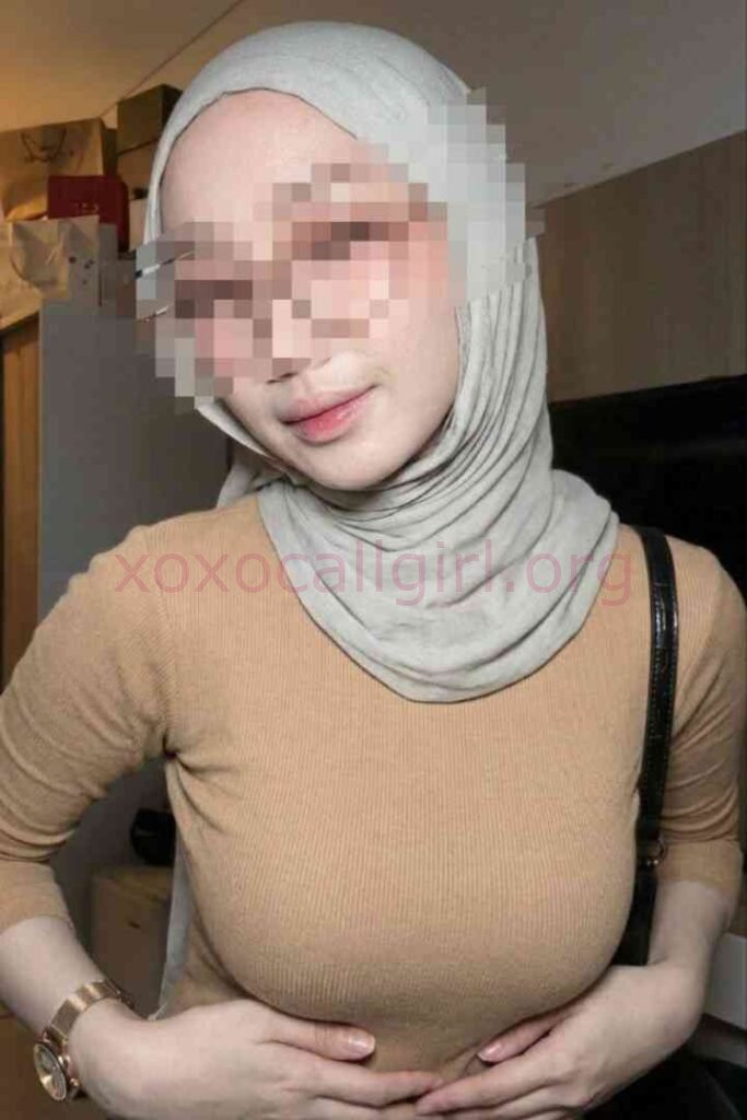 KL Escort Girl Woman in hijab and tan sweater Malaysia Sex Service